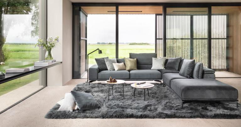 Grey sofa by Symphony Mills in a spacious living room