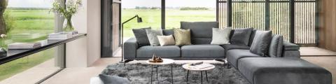 Grey sofa by Symphony Mills in a spacious living room